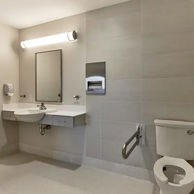 Resident room washroom with clean, modern, and well-maintained setting