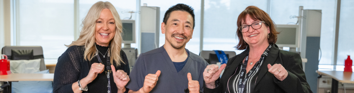 Three Lakeridge Health team members smiling and giving thumbs up