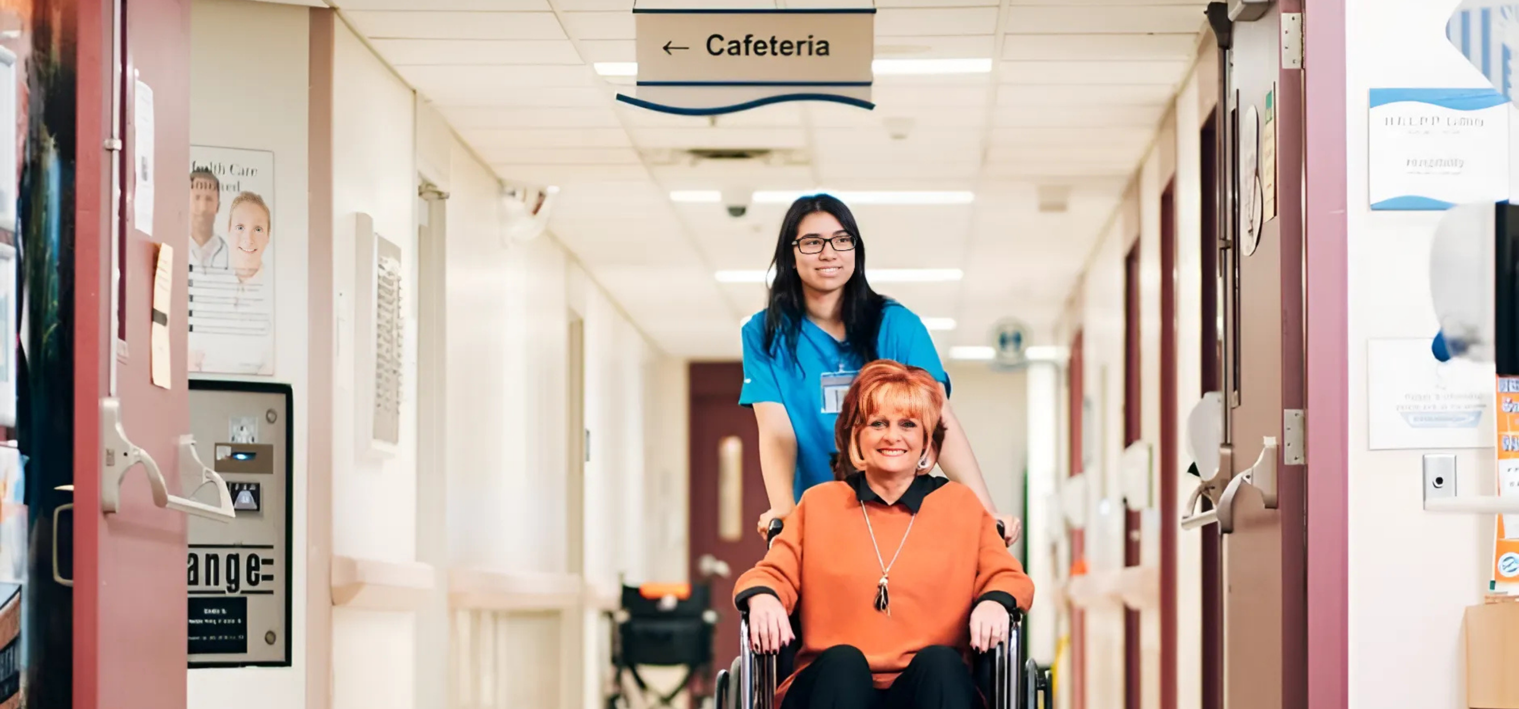 Volunteer  taking the patient to cafeteria 