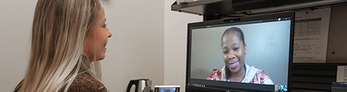 Video appointment image showing patient consulting healthcare provider through digital screen